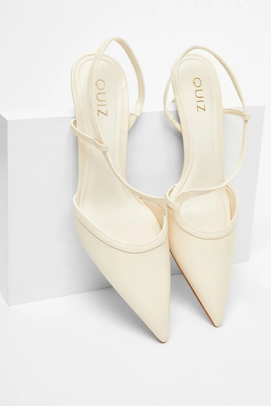 Quiz Asymmetric Court Heels Cream Online