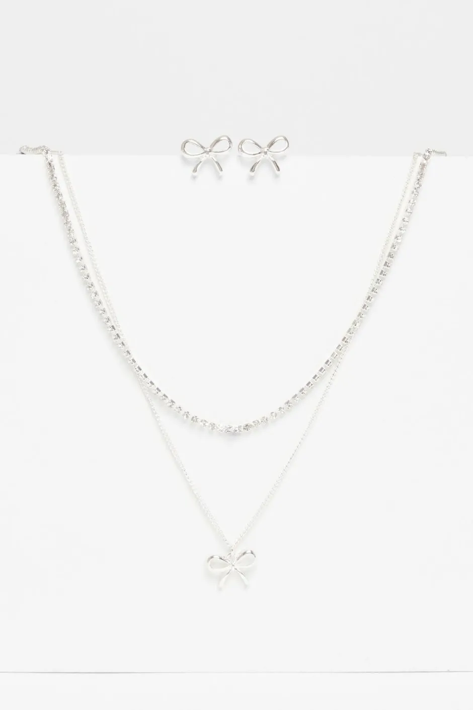 Quiz Bow Jewellery Set Silver Hot