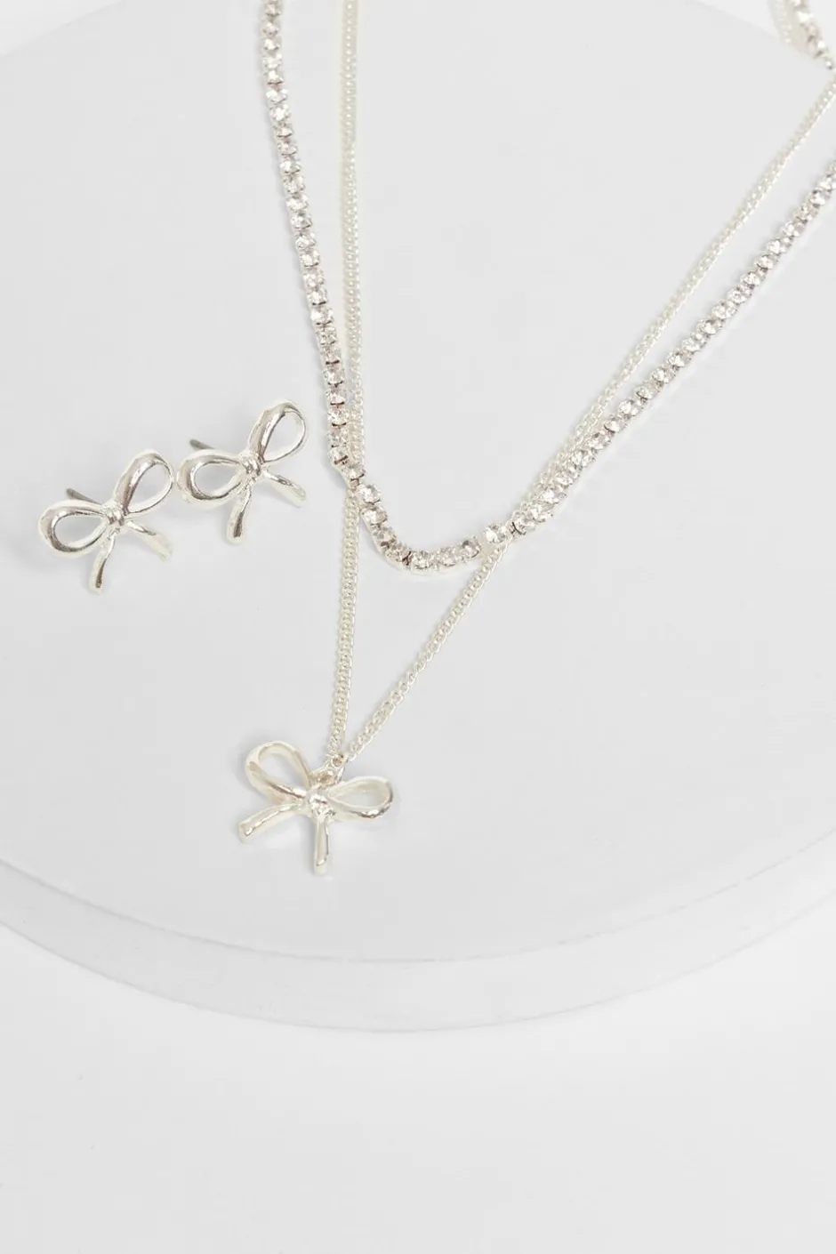 Quiz Bow Jewellery Set Silver Hot